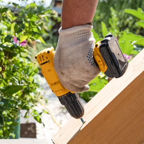 Skilled contractor installing durable custom cabinetry during a sustainable Bay Area home renovation